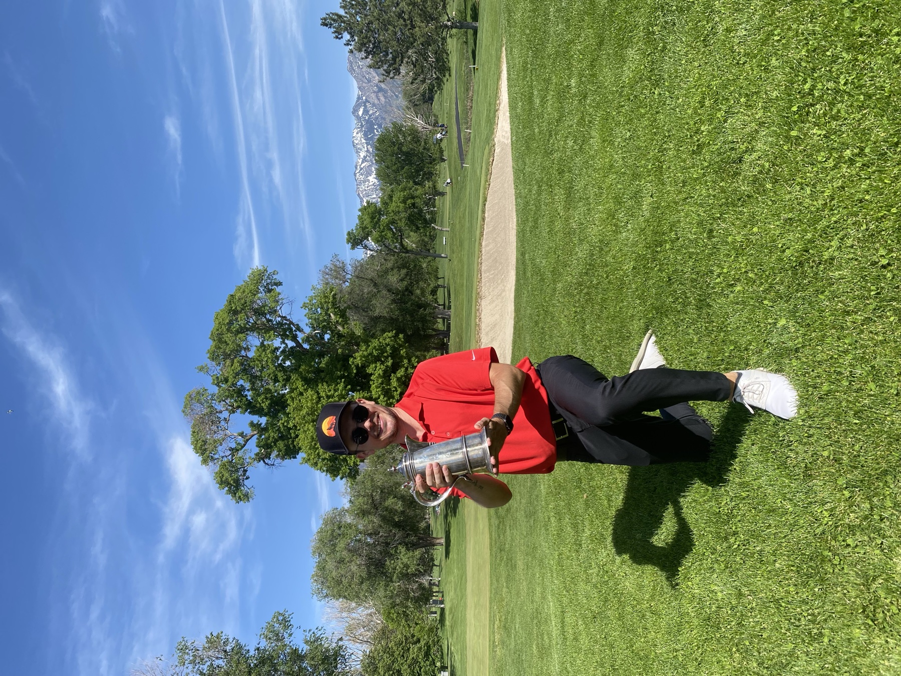 Trophy on the fairway. Mountains approve.